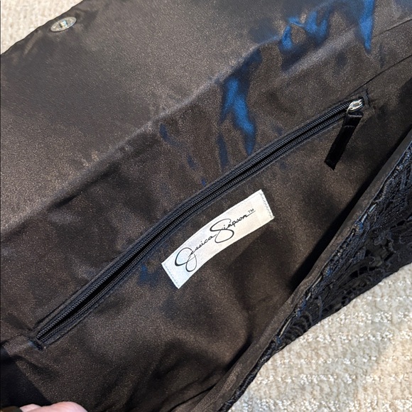 Jessica Simpson black embroidered clutch with snap closure and zip pocket - NEW - Picture 6 of 6